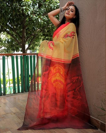 Yellow and orange durga pallu linen saree