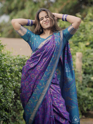 Rupali in our Purple Soft Silk Zari Woven Patola Saree with Contrast Weaves
