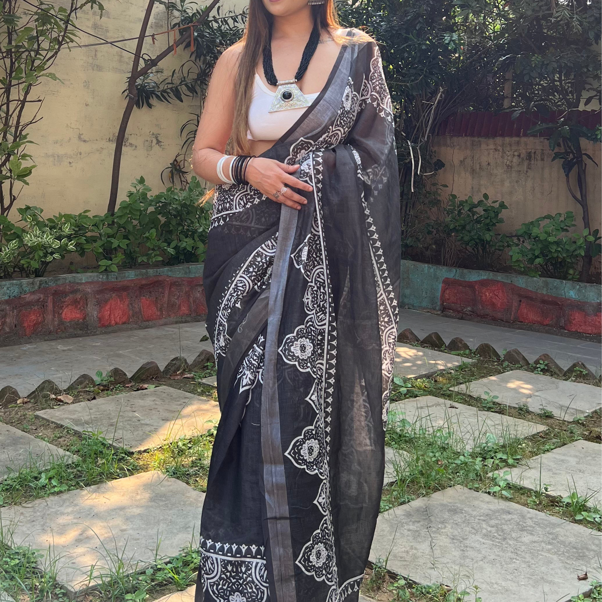 Black and White Pure Cotton Linen Saree with Intricate Floral Design and Tassels on Edges