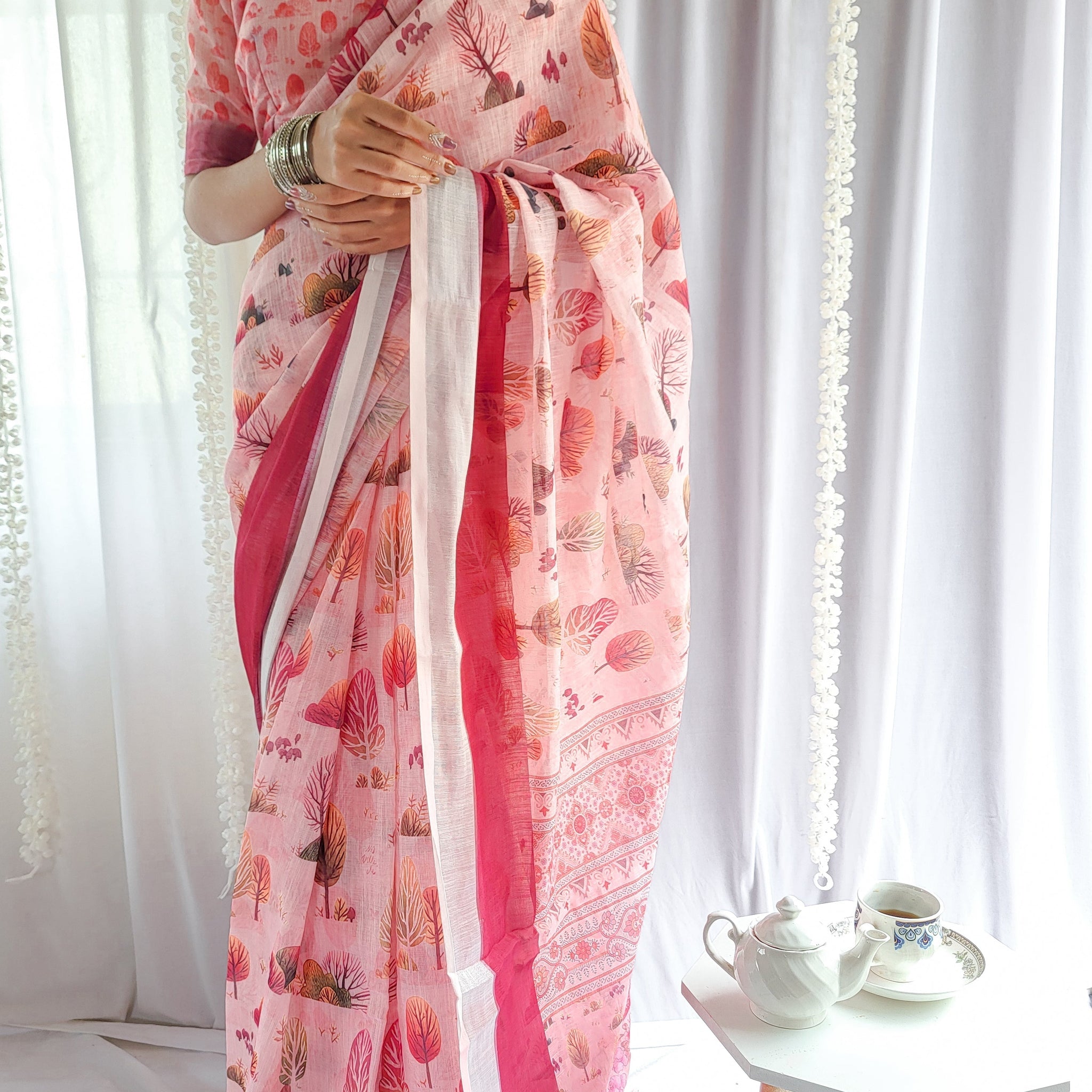 Blush Pink Handwoven Linen Saree with Vibrant Autumn Motifs & Tassel Detailing