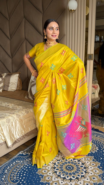 Yellow Soft Silk Ikkat Patola Saree with Meenakari Motifs Peacock Pallu and Gold Zari Border