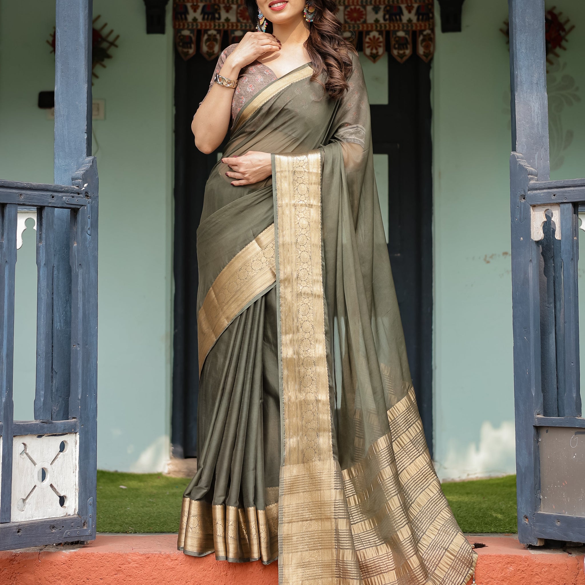 Elegant Olive Green Plain Chiffon Saree with Gold Zari Border, Floral Printed Blouse & Tassel Detailing
