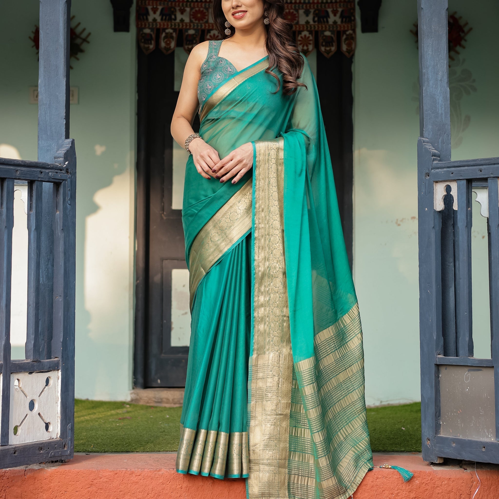 Elegant Sea Green Plain Chiffon Saree with Gold Zari Border, Paisley Printed Blouse & Tassel Detailing