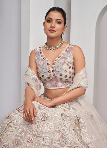 Dazzling White Lehenga Blossoming Florals and classy Embellishments