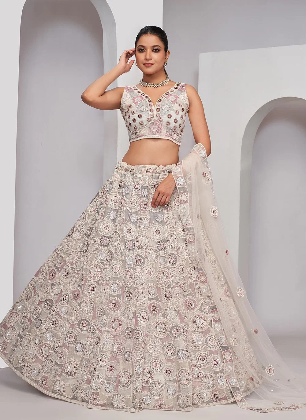 Dazzling White Lehenga Blossoming Florals and classy Embellishments