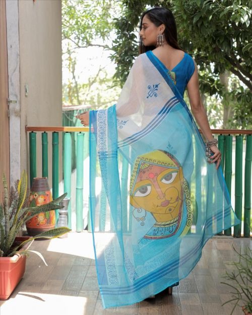 White and blue lady face pallu linen saree