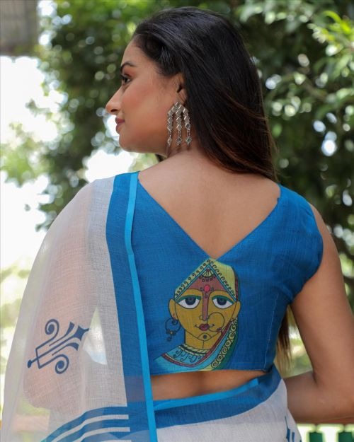 White and blue lady face pallu linen saree