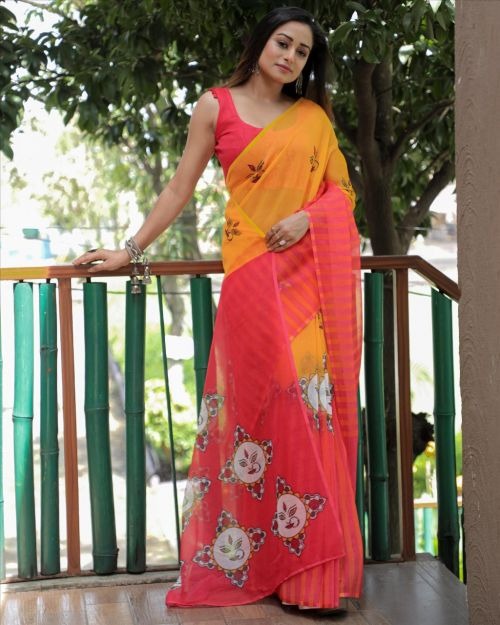 Yellow and tomato pink durga face linen saree