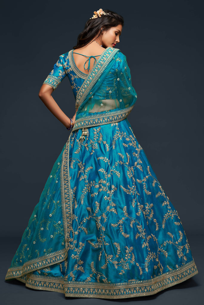 Teal Blue Embroidered Silk Wedding Lehenga 