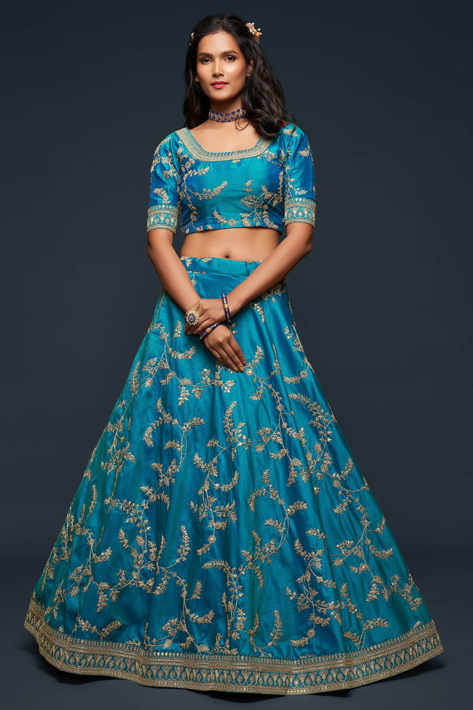 Teal Blue Embroidered Silk Wedding Lehenga 